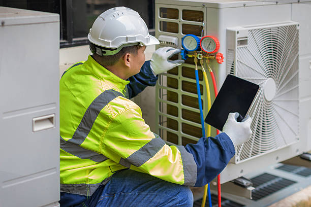 Professional Ac Installation technician working in Harvey, ND